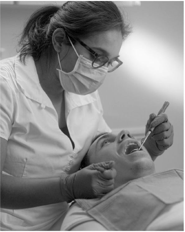 What does a dental hygienist do?